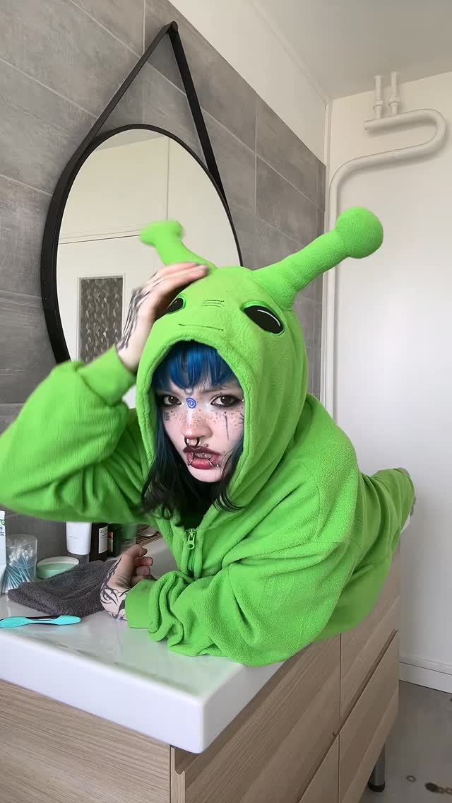 Cuz that ain’t me 👽-I did this trend a couple of years ago and I neededto bring it back with my alien onesie it’s just perfect😭...#facetattoos #tattooed #alien #selfexpression #piercings by @virgoamity