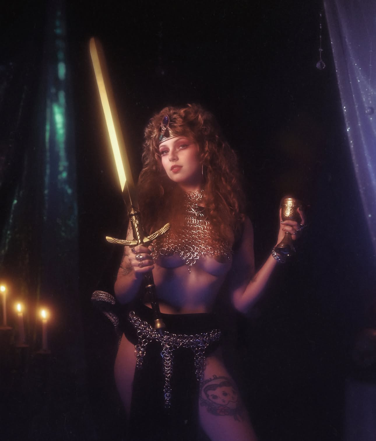 Smash open the sky, explode into the chrome lit thunder. 
  This July 18th in the summer heat get hotter than hell for a Heavy Metal mini session. A collision of fantasy, power, chains, leather and metal. 
  Come and slip into an armored bikini, grip a sword, raise an axe and become the heroine of your own cult classic fantasy epic.  These are gonna be fierce, dangerous, dramatic and hotter than hell. 

Enrollment is open, first come first slay.