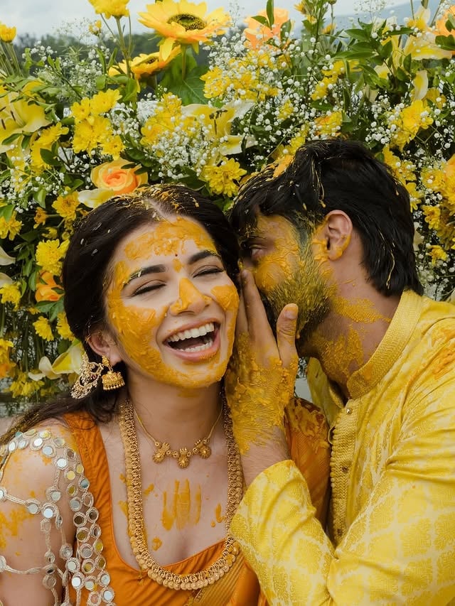 “The first chapter of forever, written in gold 💛🌿”Haldi-stained, mountain-kissed, and completely in love ✨Nestled in the misty hills of Coorg, where the air smells like rain and earth and possibility they sat among a sea of sunflowers, marigolds and wild blooms, turmeric painting their skin gold, and stole a quiet moment that the whole world seemed to pause for. 🌻🏔️This is what pure joy looks like. No perfection needed — just haldi on your cheeks, your person beside you, and the mountains watching over it all. Because some moments don’t need a filter — they just need to be felt. 🥹Love goals : @aishwaryatallani & @ashwinkushalappa 💕Adorable clicks by : @ohmywed.in Makeup: @beautylook_by_naina Mehendi : @mehendi.studiio Venue : @amritaraambattygreensresort Decor : @kodava_weddings Your Favourite @witty_wedding #wittywedding #HaldiCeremony #DestinationWedding #WeddingPhotography #weddingdiaries by @witty_wedding