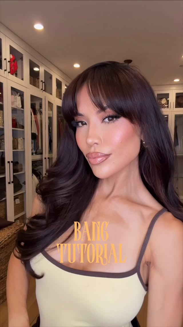 Cut the bangs ✂️ No regrets… except the extra 10 minutes of styling every morning.

First, you have to wet your bangs. Then I go in with a deman brush and @ghd_northamerica blow dryer and brush them left to right, right to left, and straight down until they’re dry. This helps train them into place and smooth out any bumps .

Once they’re dry, I like a little extra lift , so i take in @paulmitchell small round brush (about 1 inch) and give them a quick twirl. Then I let them fall naturally, split them slightly down the middle, add a little hairspray, and that’s it. #hairtutorial #bangtutorial #fringebangs #blowout #hairhacks
